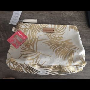 Metallic palm leaf makeup bag